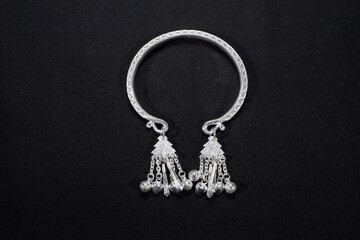 Hmong silver jewelry on black background, Handmade silver accessories