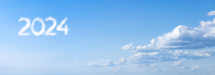 2024 New Year Concept: Clouds Forming the Year number in a Clear Blue Sky