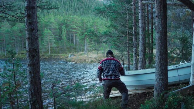 Hildremsvatnet, Fosen, Tr&oslash;ndelag, Norway - A Gentleman is in the Process of Preparing His Boat - Static Shot