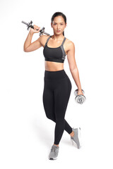 an asian woman is working out with dumbbells wearing the sport exercise suit with white background,