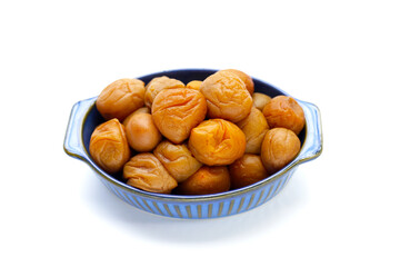 Pickled plums on white background.