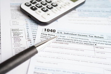 Tax form 1040 U.S. Individual Income Tax Return, business finance concept.
