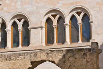Detailed view of windows of the ancient church of San Leonardo of Siponto in Apulia, Italy