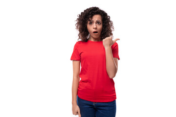 young beautiful leader woman with black curly hair dressed in a red t-shirt with mockup