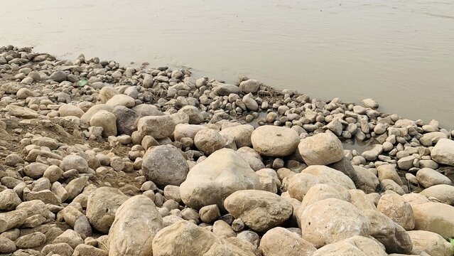 Sindh River view in punjab pakistan. Rocks in stream with smooth flowing water. beautiful natural view of sindh river. 