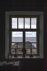 view from the lighthouse window to the sea and the blue sky