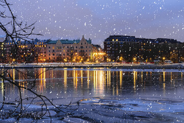 houses by the sea, snowy Helsinki evening, snowfall