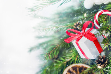 background with gift and decorations on Christmas tree