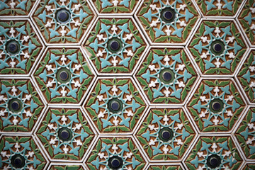 Traditional Uzbek pattern on ceramic tiles on the wall.