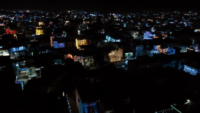 Aerial view of decoration lights on Diwali night in an Indian city. Drone view of Diwali night with twinkling electric lights. Diwali night aerial view. India from above. A Festival of Lights in India