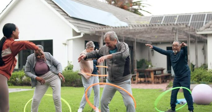 Hoop, coach or old people in fitness training together for health or exercise in retirement. Active, personal trainer or happy elderly friends in park to move body in cardio workout or challenge