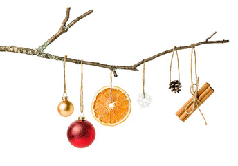 branch with Christmas decorations hanging on it, isolated on a white background. Christmas concept