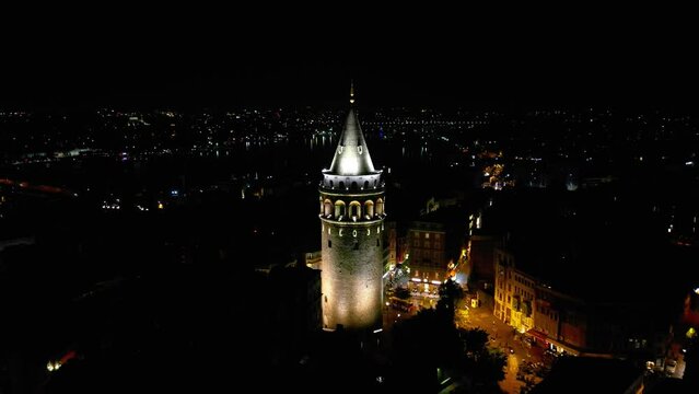 Cinematic Establishing Drone Video of the Galata Tower at Night in Beyoglu District In Istanbul, Turkey.
