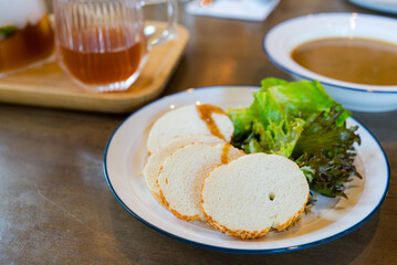 Slice of bread with salad
