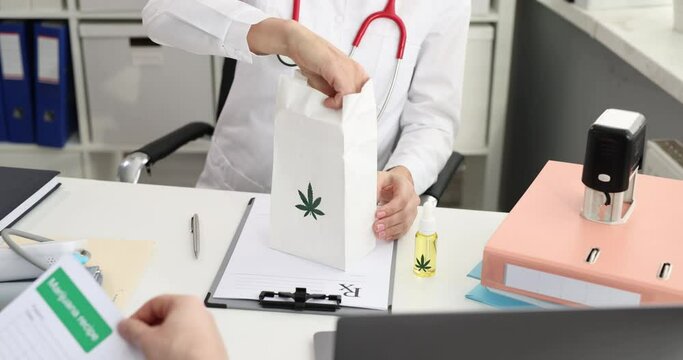 Doctor prescribes marijuana oil to patient for treatment. Ways to consume cannabis concept
