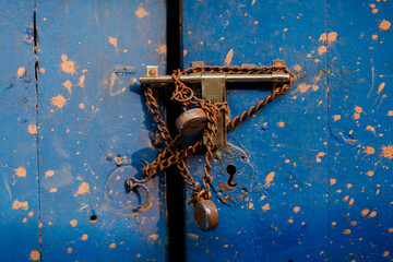 old rusty padlock on the door