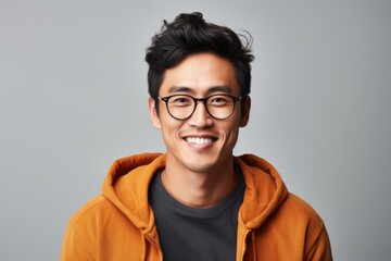Portrait of a happy young asian man