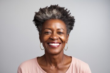 Portrait of a smiling elderly woman - obrazy, fototapety, plakaty