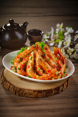 traditional chinese seafood big tiger fresh prawn with milk pumpkin salted egg yolk sauce in plate pot on grey vintage background asian cafe hotel luxury halal food restaurant banquet menu