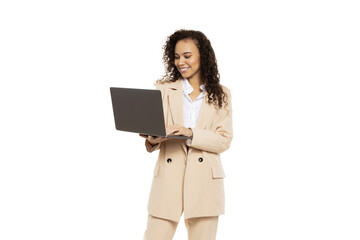 PNG, Attractive businesswoman in a suit with a laptop, isolated on white background
