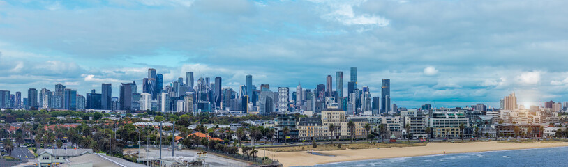 Fototapeta premium Vibrant cityscape of Melbourne where international commerce and banking activity is located. Scenic panorama skyline of financial and business center.