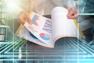 Businessman opening folder; multiple exposure