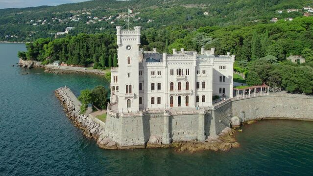 Aerial view of the Miramare Castle at the Adriatic sea coast in Italy