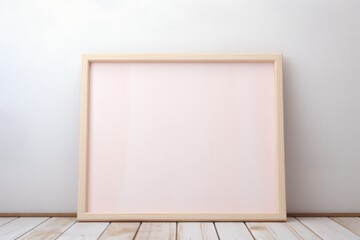A Pink Picture Frame On A White Wall