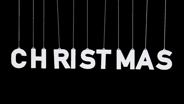 Swinging Christmas tags on transparent background. Concept Xmas holiday animation.