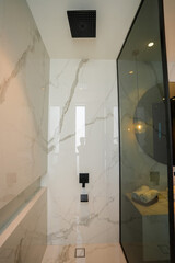 luxury bathroom interior with tiles, mirror, sink