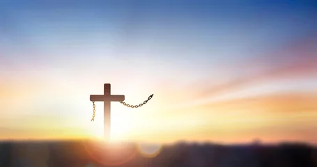 Fotobehang Cross of jesus christ break barrier wire on calvary sunday background © paul