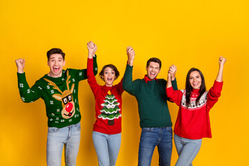 Obraz premium Photo of best buddies guys ladies have walk together on christmas holidays raise fists up isolated bright color background