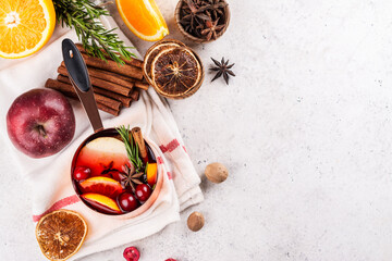 Hot mulled wine with fruits and spices. Autumn or winter warm drink