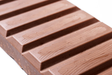 Traditional pieces of delicious Christmas chocolate nougat isolated on white background