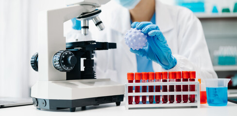 female scientist working with micro pipettes analyzing biochemical samples, advanced science...