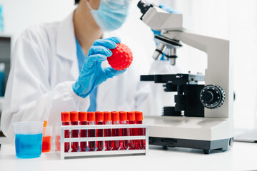 female scientist working with micro pipettes analyzing biochemical samples, advanced science...