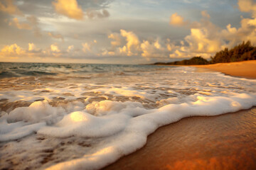 A beautiful wild beach, the waves of the clear sea roll on the white sand. evening sea.