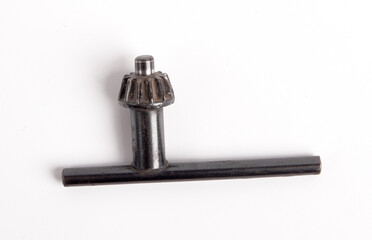 Old Drill Chuck Key Wrench For Clamping A Drill Closeup Photo Isolated On White Background