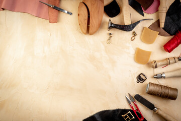 Leather shoe workshop, hand craft. Set of tools on the table - obrazy, fototapety, plakaty