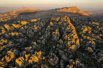 Unreal rock formation and landscape of Torcal de Antequera in Malaga, Andalusia, Spain. Aerial...