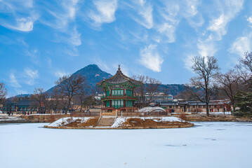 Snow falls in winter at Gyeongbokgung Palace, Seoul, South Korea.	