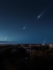 Falling meteorites over the evening city. Meteors in the sky. Night landscape with star rain.