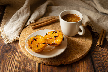 Typical Portuguese dessert pastel de chila - pastry tarts of squash with a cup of coffee. traditional portuguese sweets