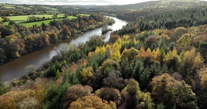 The River Nore against the backdrop of Ireland's autumnal mountains 4k