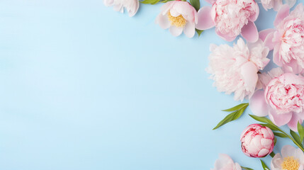 Elegant feminine wedding or birthday flat lay composition with pink peonies floral bouquet. Blank paper card, mockup, invitations. Flat-lay, top view on  pale blue background.