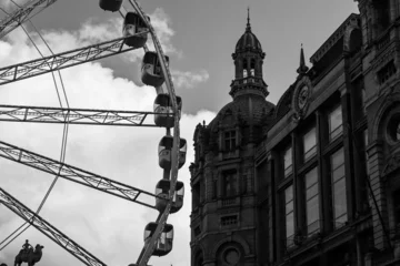 Fotobehang Antwerp, Belgium - October 22, 2023: Ferris wheel in the center of Antwerp near the central station © Andrei Antipov