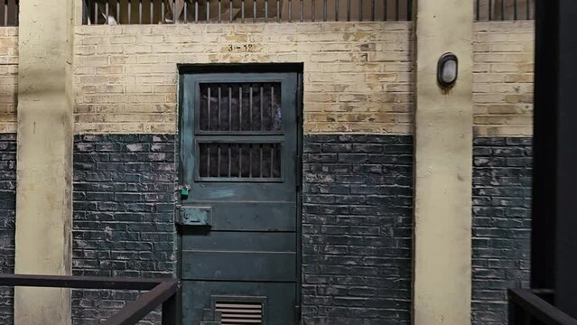 Walking Towards LOcked Door of Old Korean Prison Cell at Iksan Film Drama Set