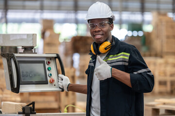Wood mechanic inputs data, automates machines for cutting, laser, saw, milling, lathe in factory