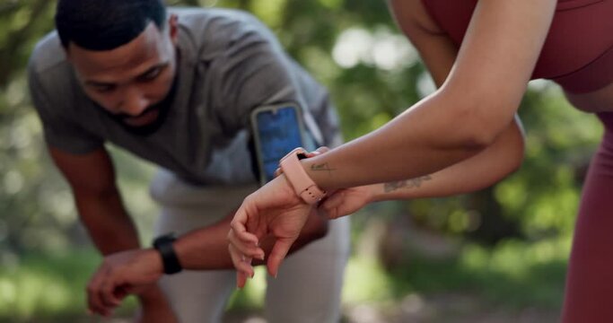 Couple, watch and time for exercise outdoor at a park for fitness and workout. Timer and progress of athlete man and woman in nature for cardio app, sports challenge and training or performance