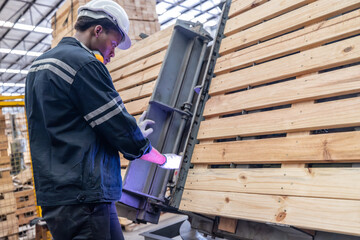 Wood mechanic inputs data, automates machines for cutting, laser, saw, milling, lathe in factory